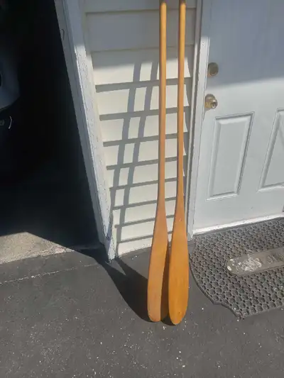 Wooden paddles 5 feet long in good condition Asking $40.00 Call or text 204 7927702.