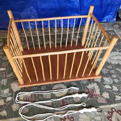 Newborn cradle, handcrafted from natural materials., View more