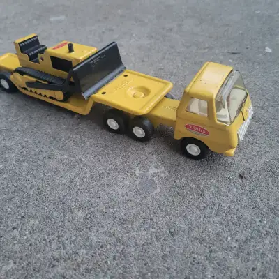 Tonka 1970s flat-bed hauler with bulldozer #55310, View more