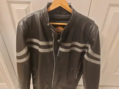 This is a very nice, affordable leather motorcycle jacket with good venting and a removeable liner f...
