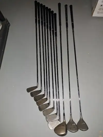 Set of golf clubs. Executive 3-pw irons, spalding 1 & 3 woods and mizuno driver.