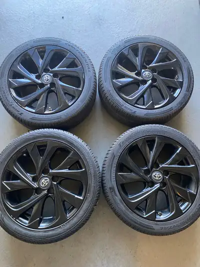Selling a clean set of OEM Toyota 17” gloss black rims with Continental all-season tires. Perfect fi...