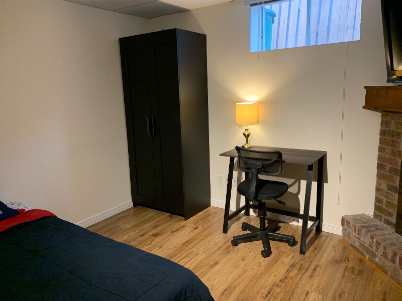 Furnished room for rent in a fully furnished basement apartment Room