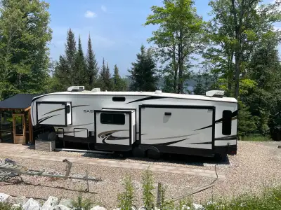 Looking for a luxury fifth wheel that feels like home? This 2022 Forest River Sabre 36BHQ is in imma...