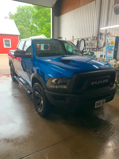 Nice blue 2000 and 22 ram 1500 warlock crew cab 4 by 4 com. a heated in cool seats heated. steering...