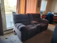 Loveseat with dual recliners for sale