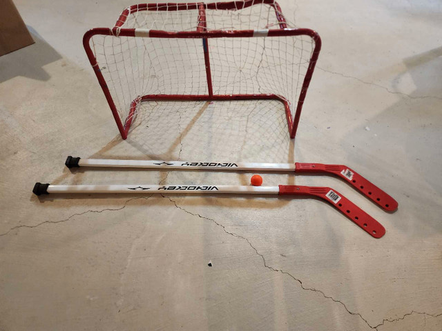 Small hockey net with sticks in Hockey in Hamilton