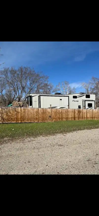 2020 keystone Residence 401 loft 3 slides on fenced titled lot at birds point Round lake Sask call D...