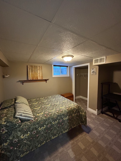 Fully furnished basement bedroom with private bathroom in separate area perfect for temporary worker...