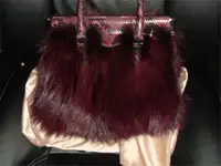 Prada handbag  maroon made of python and fox fur $7300