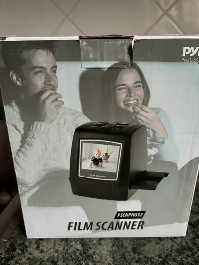 Film scanner Was only used a couple of times. Has all the parts and instructions. Great for slides,...