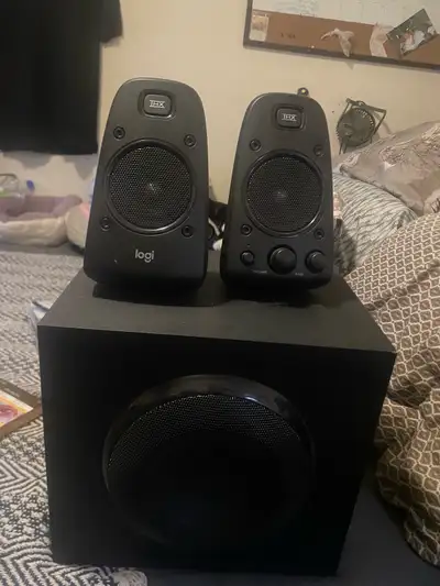 Elevate your audio experience with this Logitech THX multimedia speaker system, delivering rich, imm...
