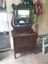 Antique dresser. $250.00