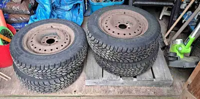 Set of winters on rims. Goodyear Nordics. 195/65R15. Treads are still good.