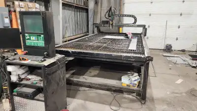 This is an Ultra-Cut Thermal Dynamics 200amp plasma table (HD PLASMA). Set up to cut mild steel, alu...