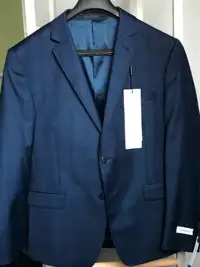 Brand NEW Calvin Klein Men's suit in blue (blazer size 44S 37W,