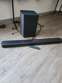 Selling sound bar with bass.