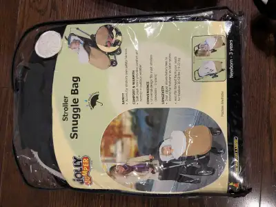 Keep your little one snug as a bug with this brand-new Jolly Jumper Stroller Snuggle Bag, designed f...