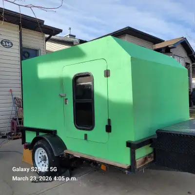 Custom made trailer. 1200lbs. No leaks. Needs tires. Hitch lock and tire chocks included.