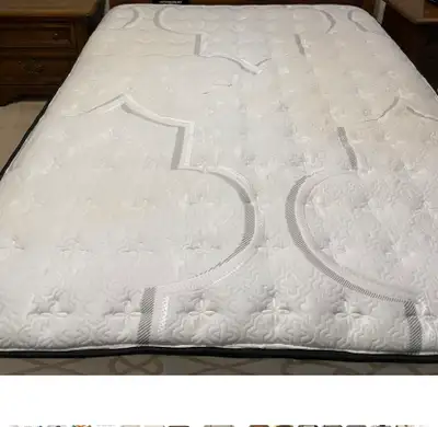 Sealy Posturepedic Queen mattress with box spring and frame