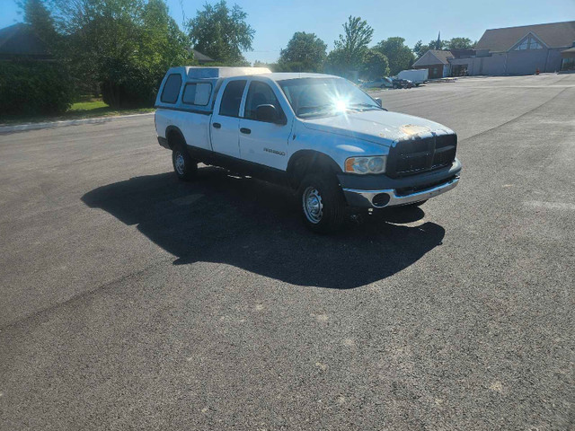 **Dodge Ram 2500 5.9 diesel 4x4 long box crew cab topper in Cars & Trucks in St. Catharines - Image 4