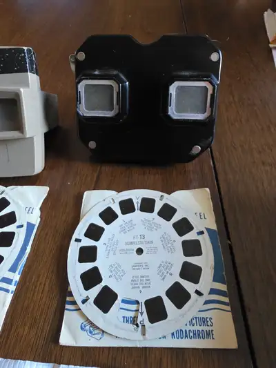 Wonderful pair of Vintage Viewmasters with 11 interesting and fun disks. Black viewer is in excellen...