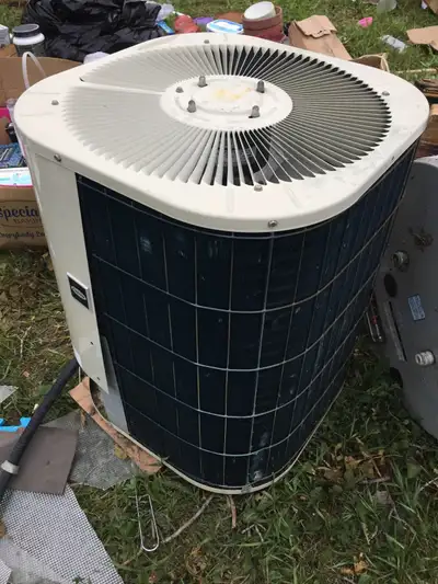 For sale is a used Lennox central air conditioner unit, perfect for keeping your home cool during th...