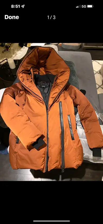 New never worn MAKAGE Adali authentic winter coat. It is a orange type colour. Really nice. Costs cl...