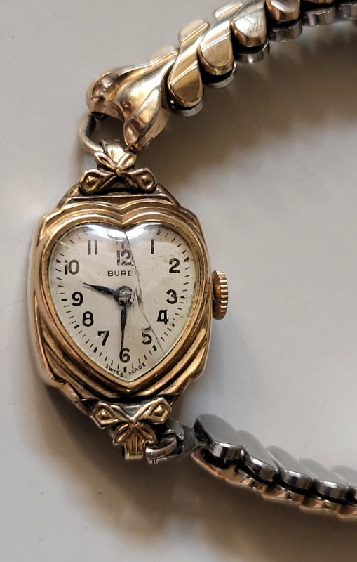 Buren grand prix ladies gold watch hotsell