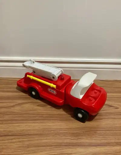 Large vintage little tikes fire truck 1980s 15 inch long Good condition Pet free and smoke free home...