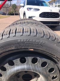 Used Michelin X Ice winter tires on rims