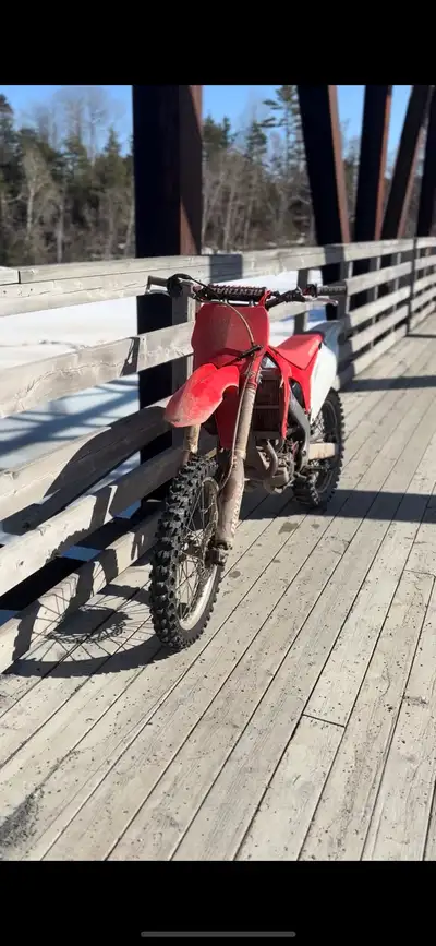 2009 Honda CRF 450 R has paperwork for Yoshimar exhaust system brand new front tire renthal bars $50...