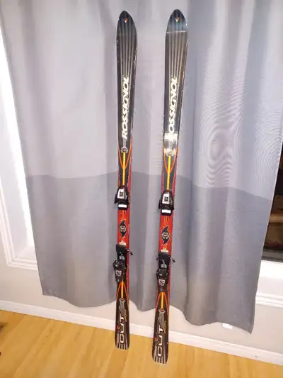Rossignol skis 184 cm, Salomon bindings, tuned, waxed, ready to go. Ski poles Gabel, boots size 12.