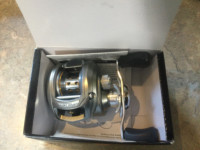 New in box Pro Qualifier Baitcast reel from BassPro shops
