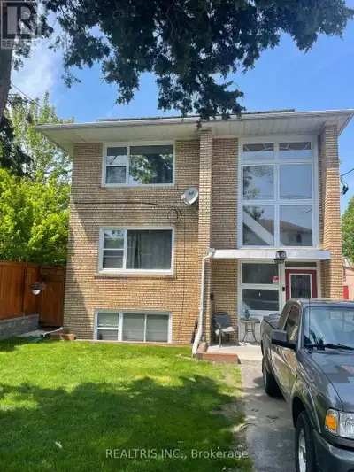 Attention investors! Discover a rare, purpose-built triplex in the desirable Long Branch community o...