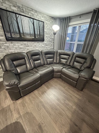 Sectional rocker recliner couch