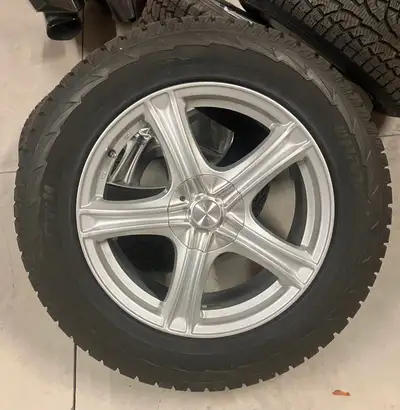 Get ready for the winter season with this set of Hankook winter tires mounted on rims, sized P235/65...
