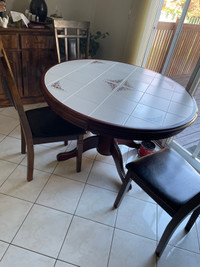 Small wooden round dining table 