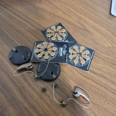 I am selling a pair of used Phonak hearing aids, which come with Kirkland batteries size 312. These...