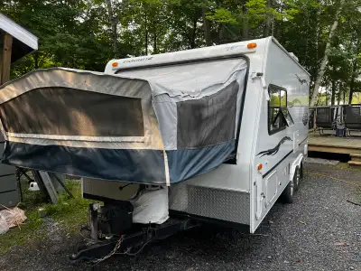 18 year-old StarCraft, 19 foot hybrid camper trailer for sale. Unit has extensive floor damage from...