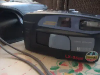 Ricoh LX-35sWDate 35 mm film camera & more. 2967, View more