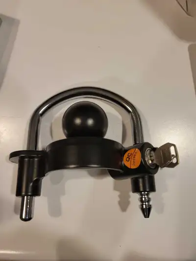 trailer hitch coupler lock, designed to secure trailers and caravans against theft. Anti-Theft Desig...