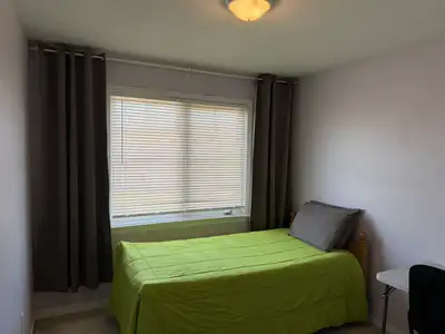 One bedroom with a single bed in a beautiful townhouse located in Kanata, shared bath room with 1 pe...