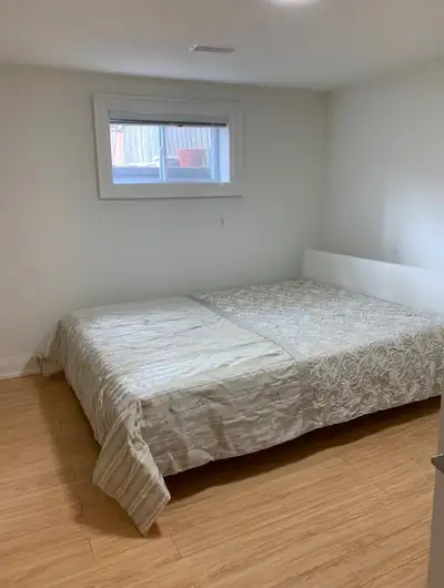 Bright, private bedroom in a fully renovated basement. Shared kitchen, dining area, and bathroom wit...