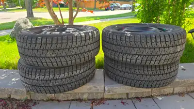 Set of 4 x 16" 205/55/R16 tires with 80% threads left, on black steel rims of 5 bolts. Originally fr...