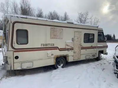 RV with interior gutted. See pictures for details. Good for storage or making into ice fishing huts....