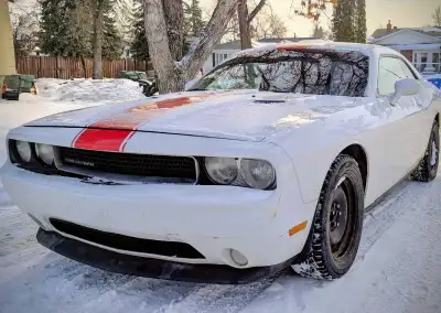 2013 Dodge Challenger SXT Runs and drives, presently on studded winter tires on steel rims. It has a...