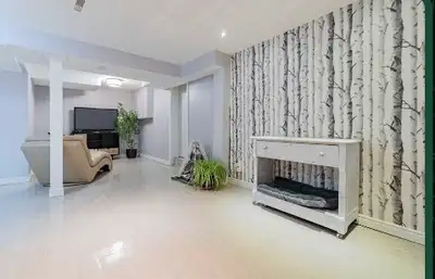 Room for rent for a girl in sharing with another girl . Clean new basement. Rent is $450 including u...
