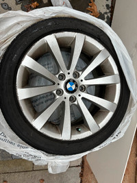 BMW tires with rim for sale.