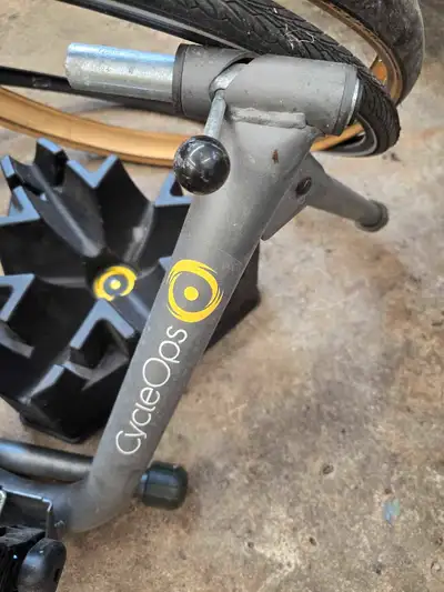 This CycleOps Fluid2 bike trainer is a great way to stay in shape indoors. It features a fluid resis...